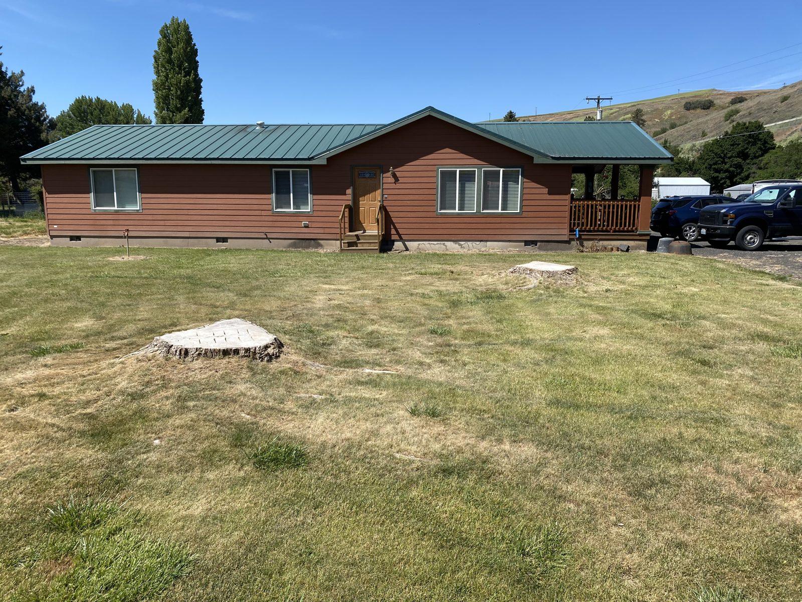 Maintained lawn and plantings after a job